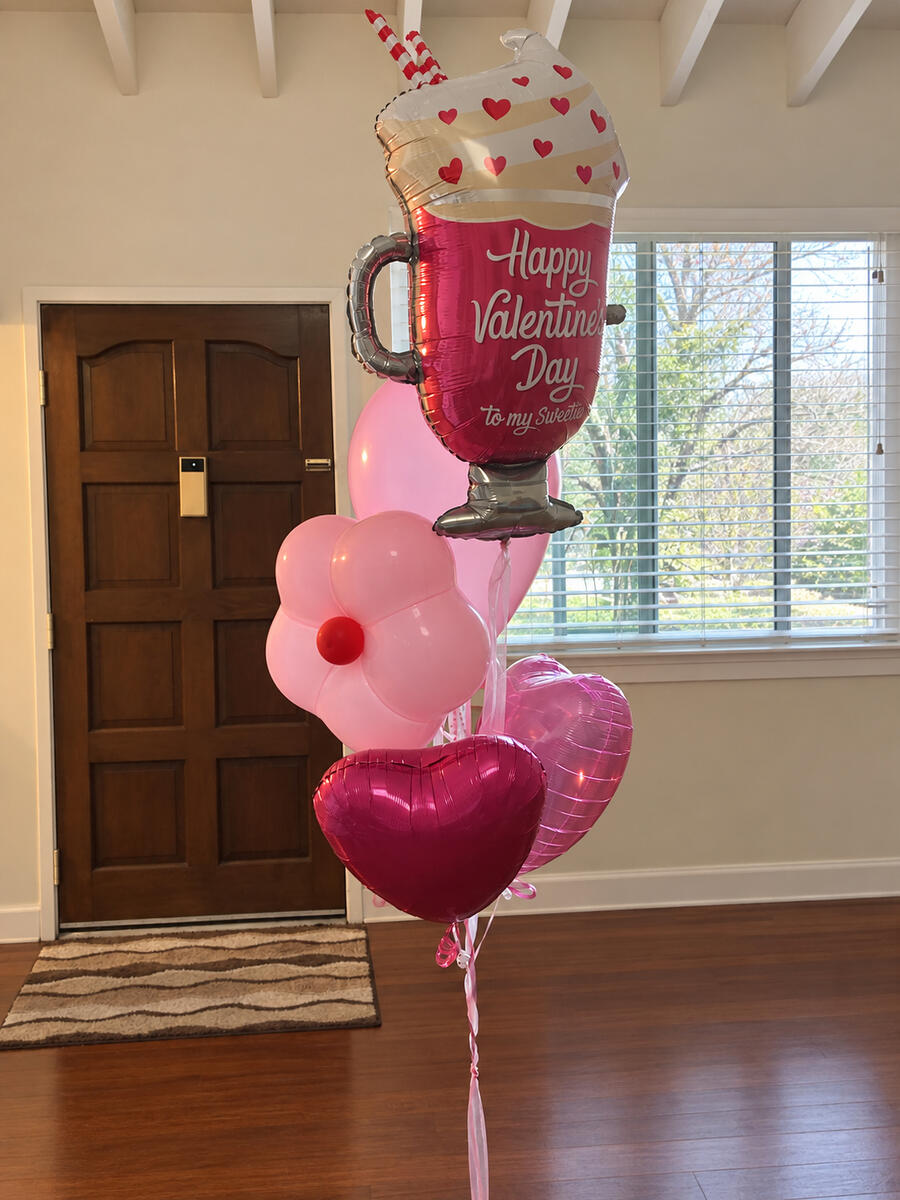 Pink Valentine bouquet with a flower balloon, heart foils and a sweet-drink foil balloon.